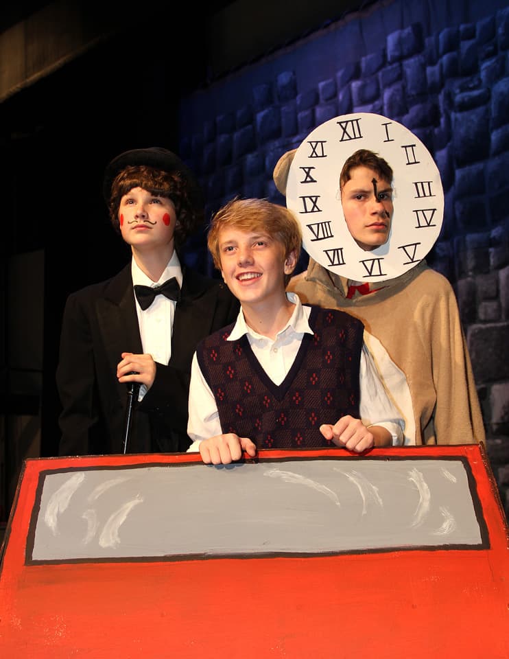 Milo motors past the blue stone walls with the ticking watchdog Tock at his side — The Phantom Tollbooth, fall 2014.